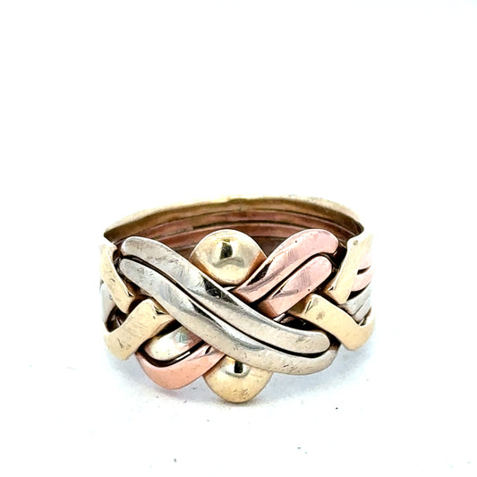 9ct yellow gold puzzle ring in size U1/2, featuring interlocking band design, crafted by Reeves and Sons.