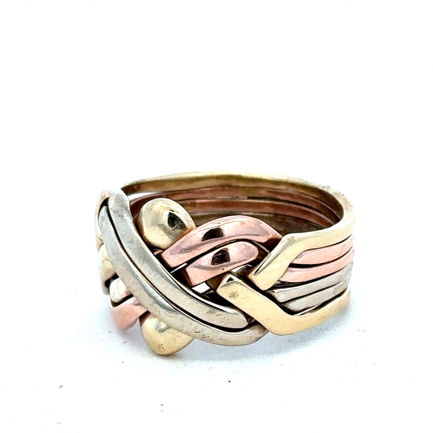 9ct yellow gold puzzle ring in size U1/2 with intricate design, featuring interconnected puzzle pieces, crafted by Reeves and Sons.