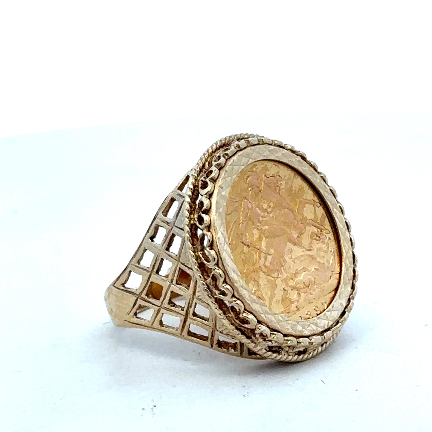 9ct yellow gold sovereign ring with 1897 full sovereign engraving, size X, by Reeves and Sons, featuring detailed coin design.