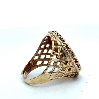 9ct yellow gold sovereign ring with 1897 full sovereign design, size X, by Reeves and Sons, detailed engraved pattern visible.