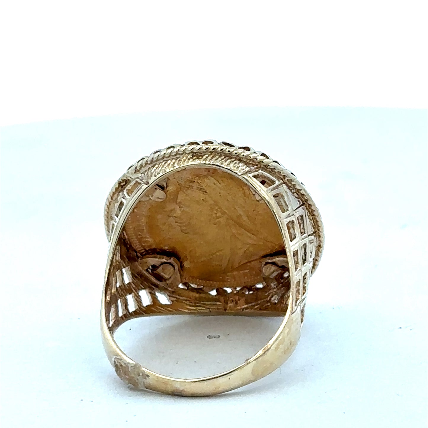 9ct yellow gold Sovereign ring with detailed coin design, size X, by Reeves and Sons.