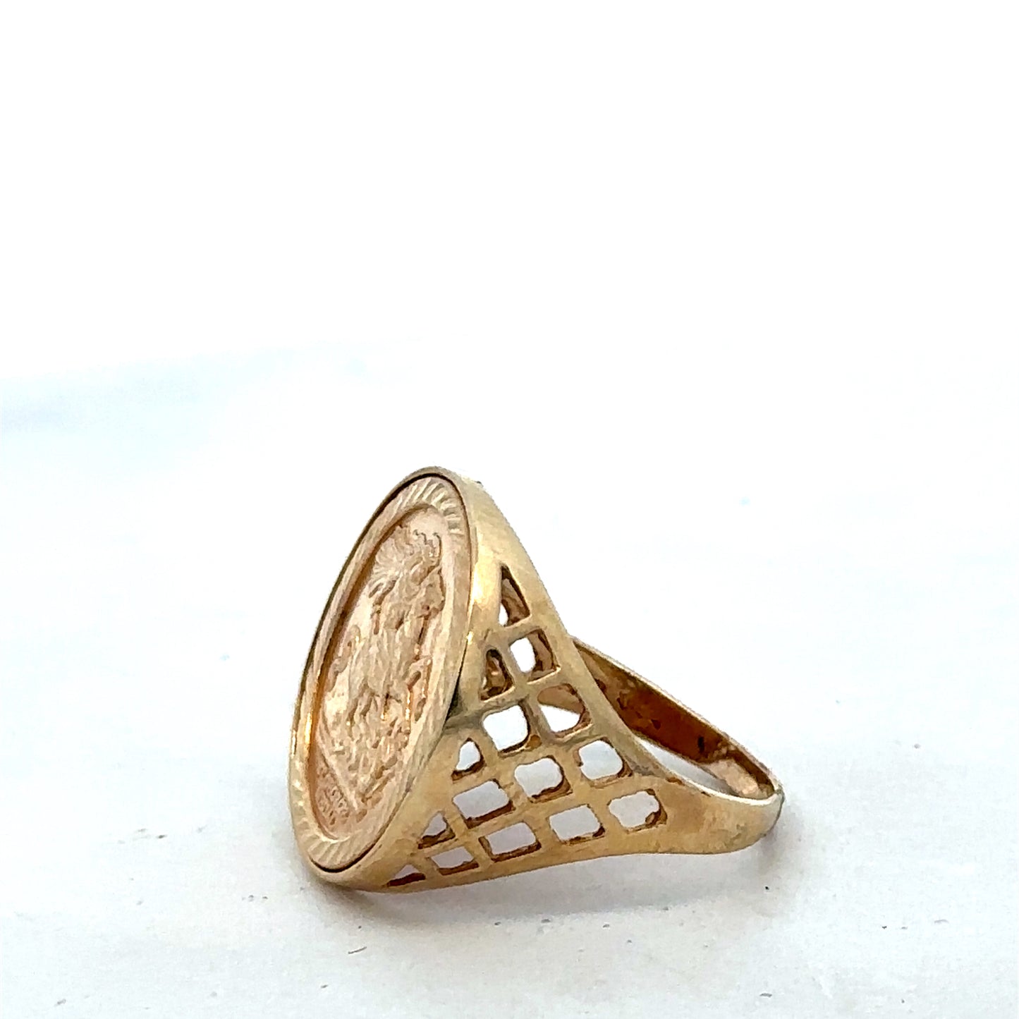 9ct yellow gold St George ring in size V with detailed engraved design, crafted by Reeves and Sons.