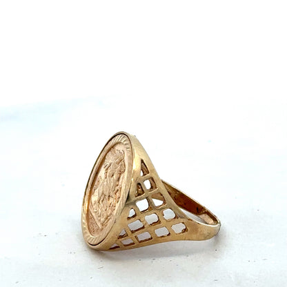 9ct yellow gold St George ring in size V with detailed engraved design, crafted by Reeves and Sons.