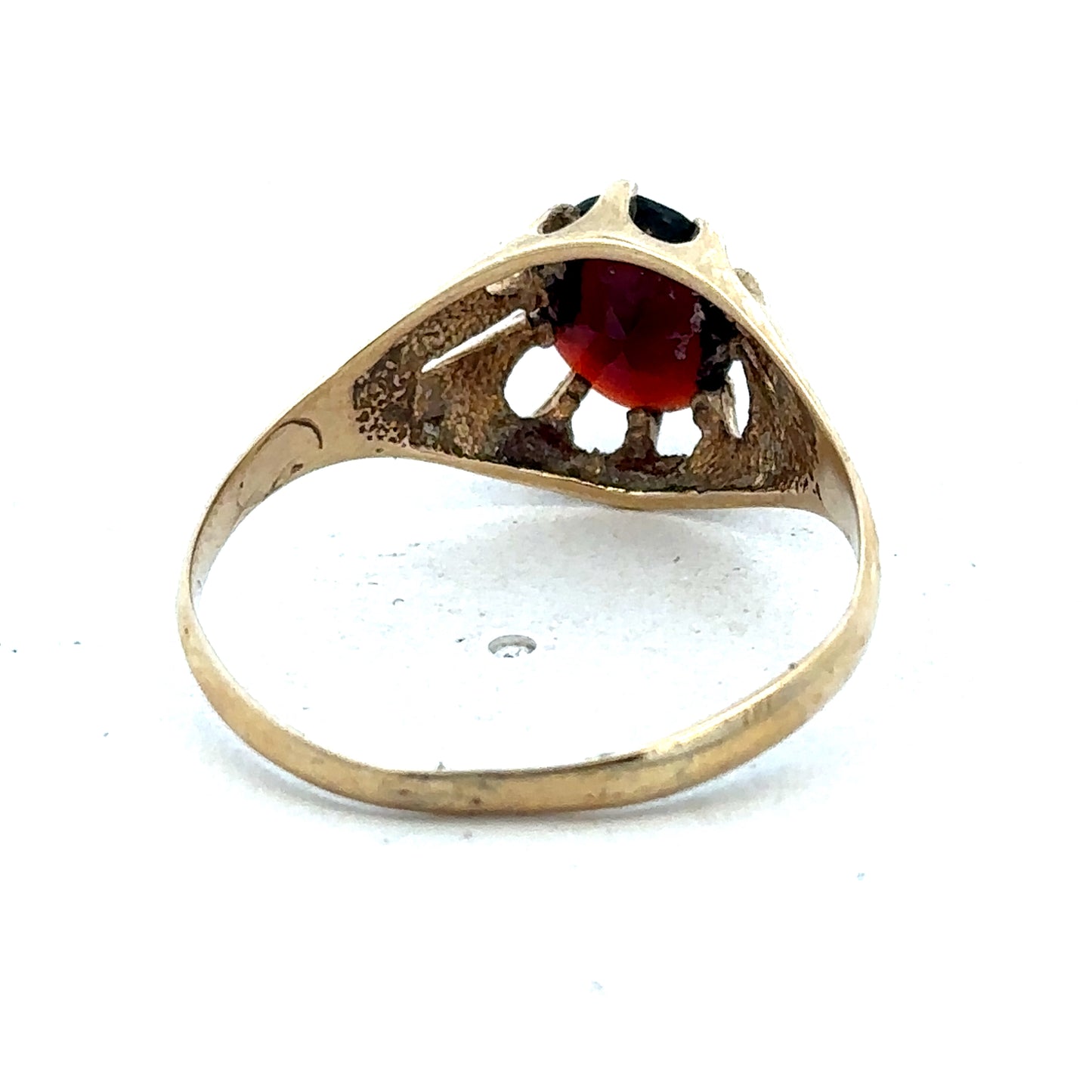 9ct yellow gold ring size V by Reeves and Sons, showcasing a polished band with smooth finish on a white background