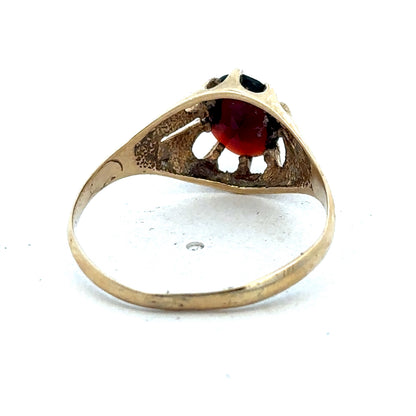 9ct yellow gold ring size V by Reeves and Sons, showcasing a polished band with smooth finish on a white background