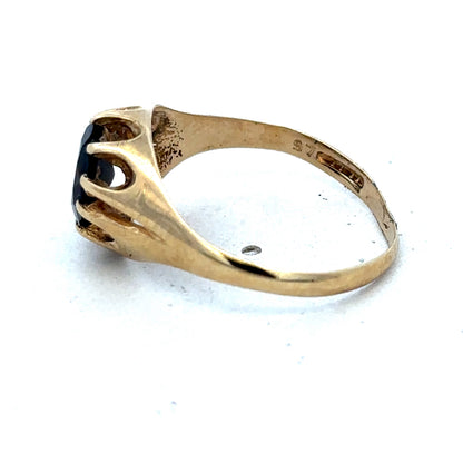 9ct yellow gold ring in size V from Reeves and Sons, showcasing a smooth, polished band with a subtle shine.
