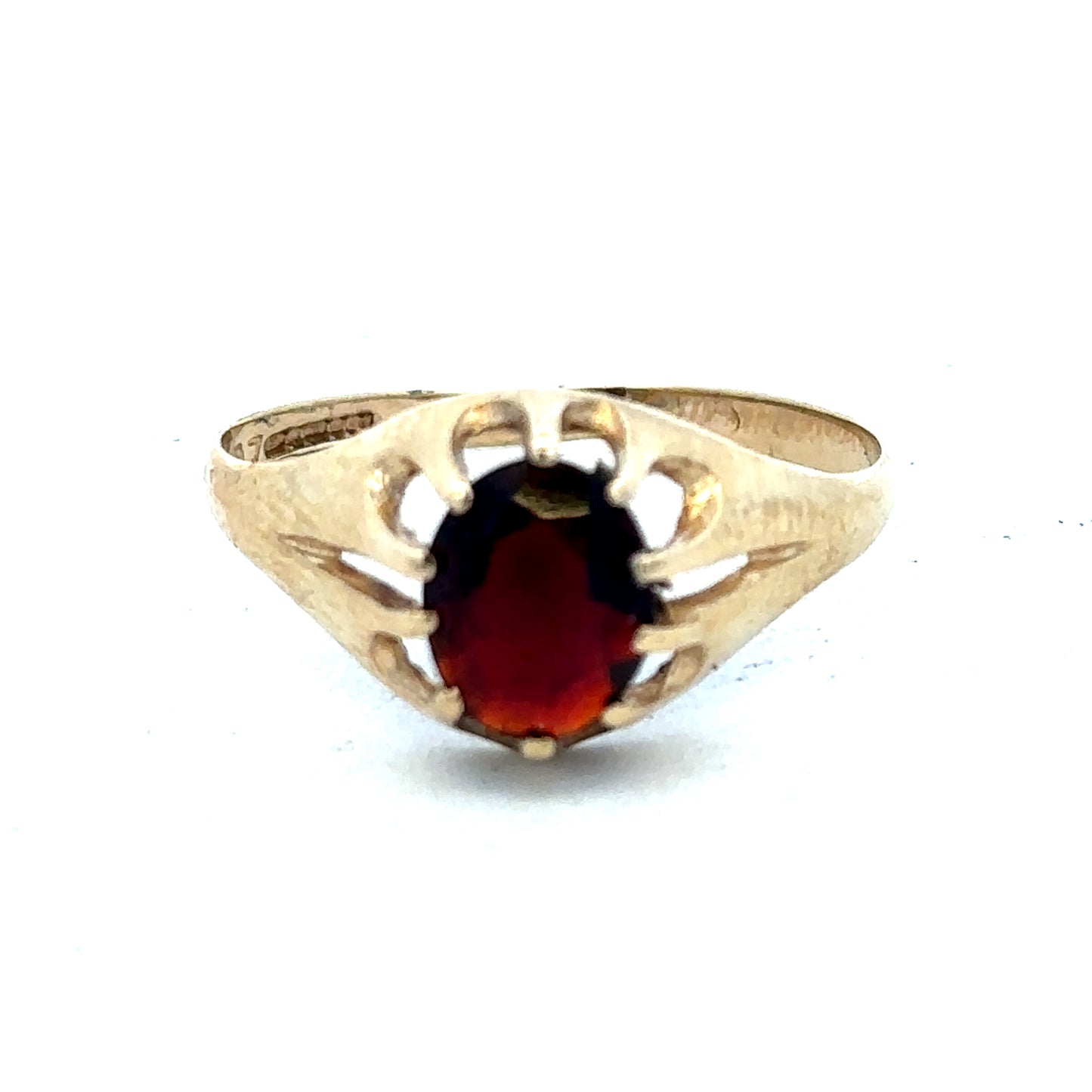 9ct yellow gold ring in size V with a smooth band, crafted by Reeves and Sons, displayed on a neutral background.