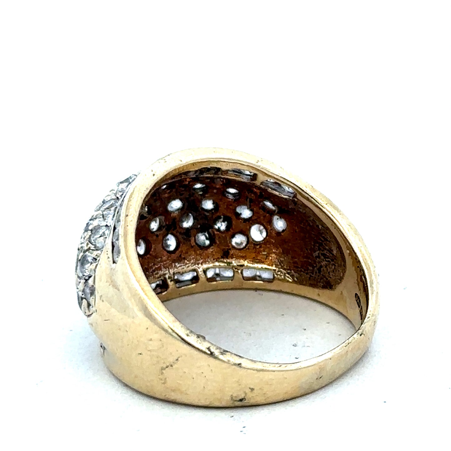 9ct yellow gold ring size U by Reeves and Sons, close-up showing polished band with smooth finish.