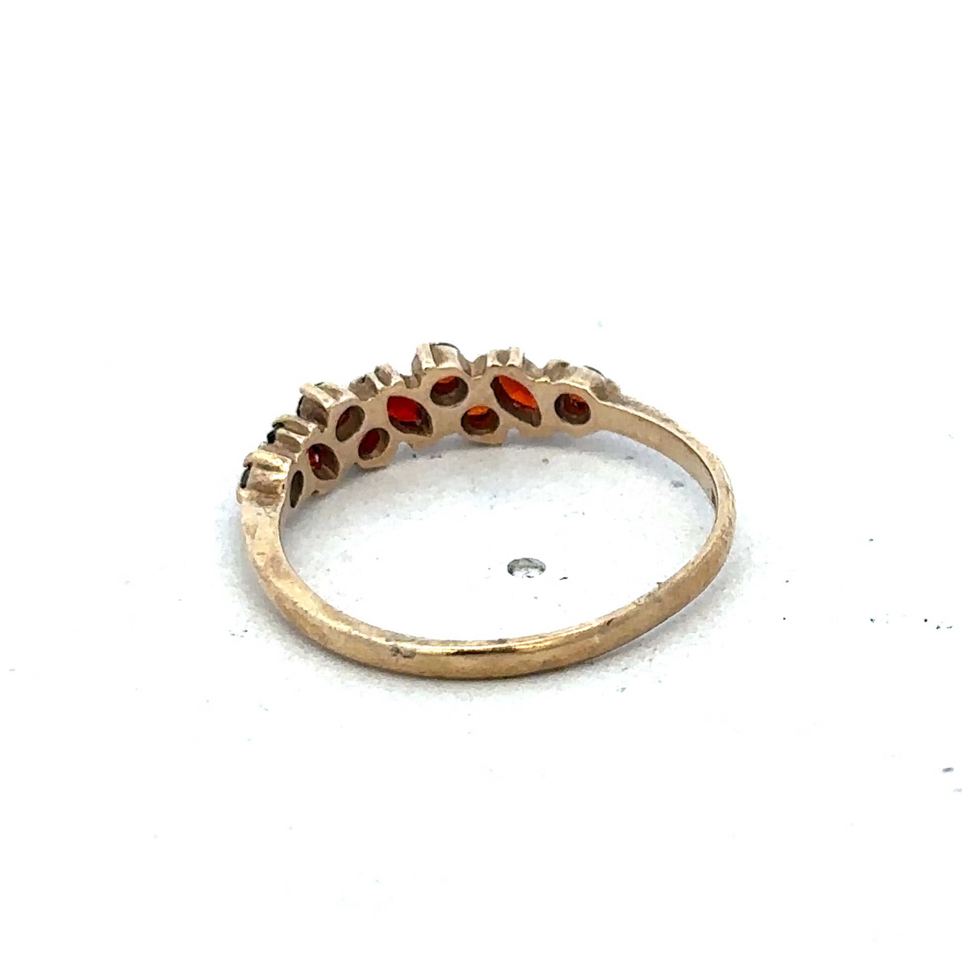 9ct yellow gold ring size N by Reeves and Sons, close-up image showing polished band and elegant design.