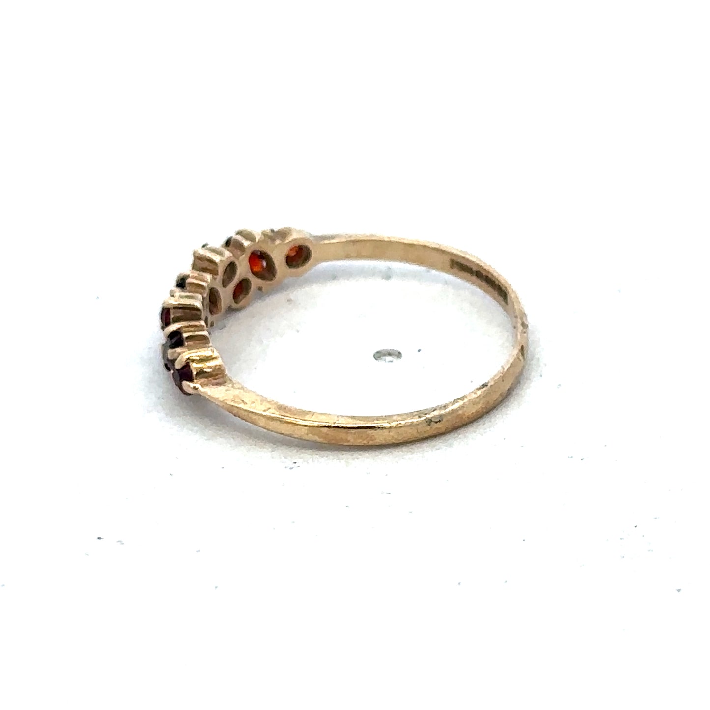 9ct yellow gold ring size N by Reeves and Sons, showcasing a polished band with a smooth finish.