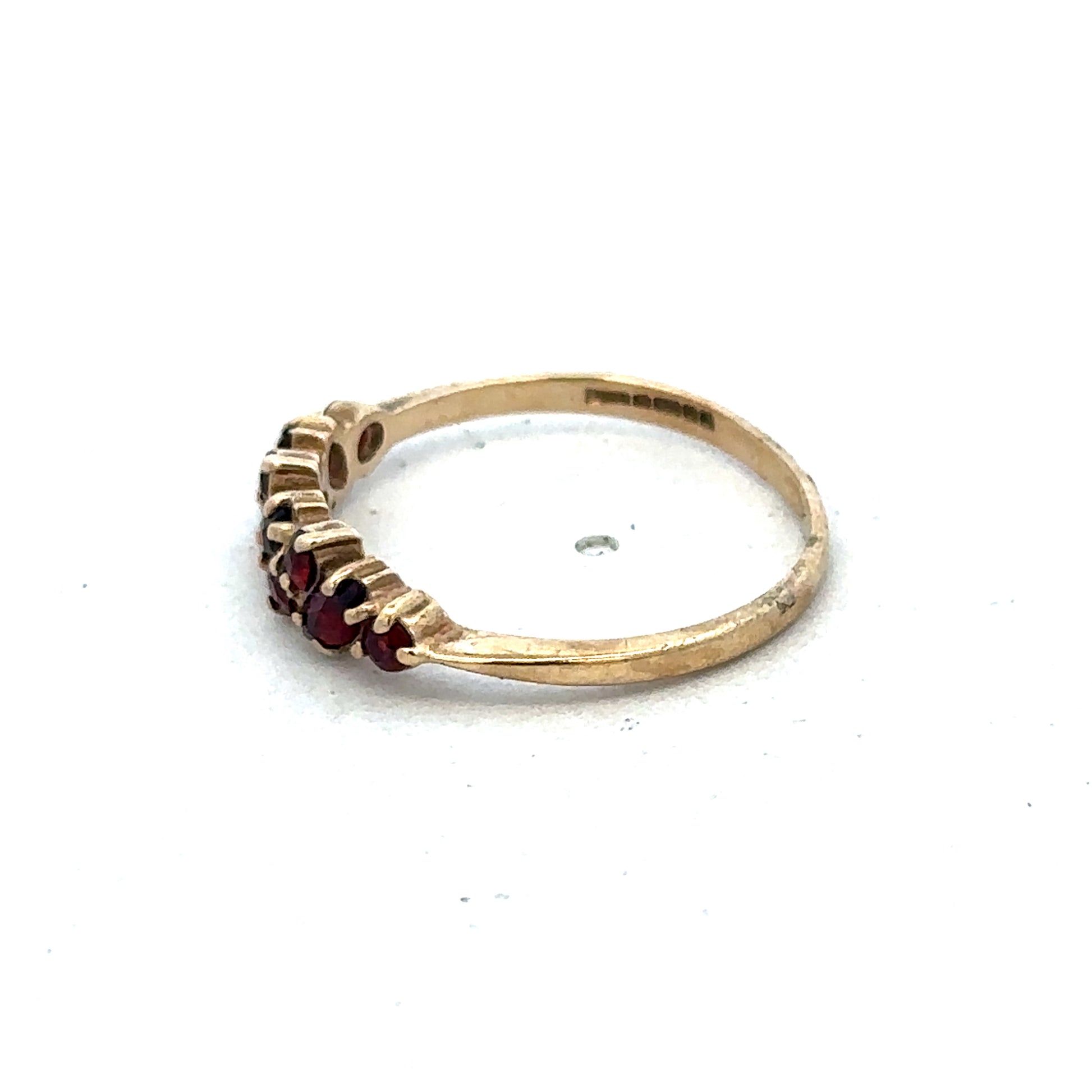 9ct yellow gold ring size N with a smooth band, crafted by Reeves and Sons, displayed on a neutral background.