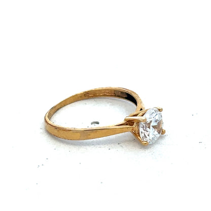 9ct yellow gold ring in size L with a smooth polished band, crafted by Reeves and Sons.