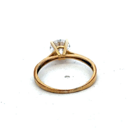 9ct yellow gold ring in size L by Reeves and Sons, featuring a smooth polished band visible in the image.