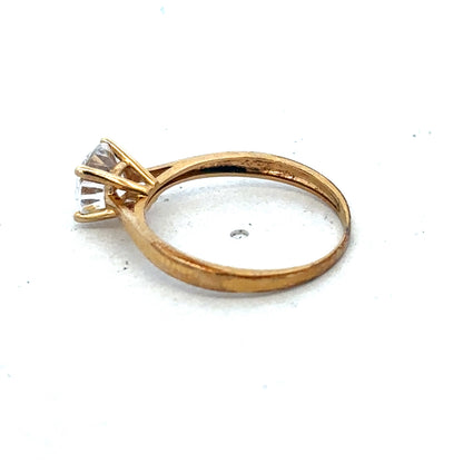 9ct yellow gold ring size L by Reeves and Sons, featuring a smooth polished band and classic design.