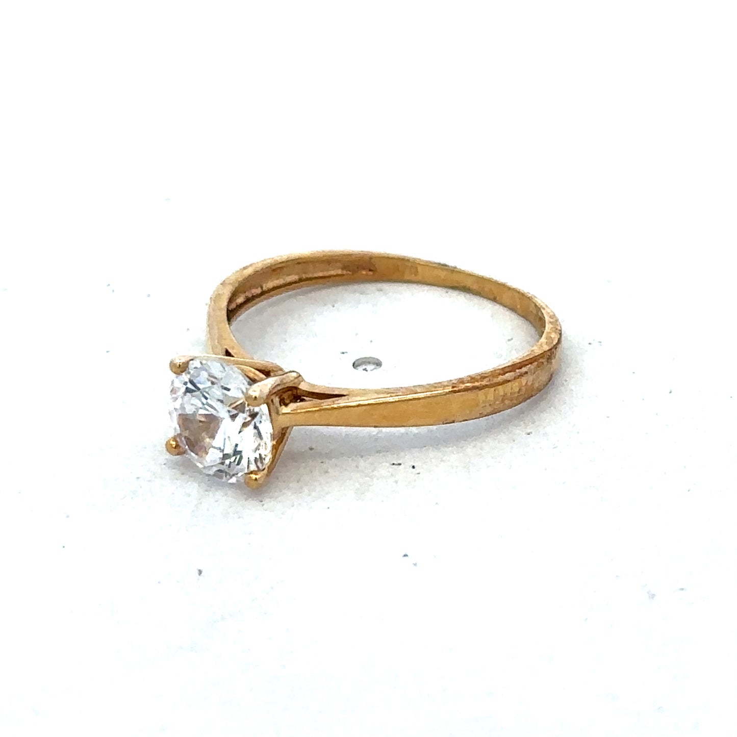 9ct yellow gold ring size L by Reeves and Sons, featuring a smooth polished band with a classic design.