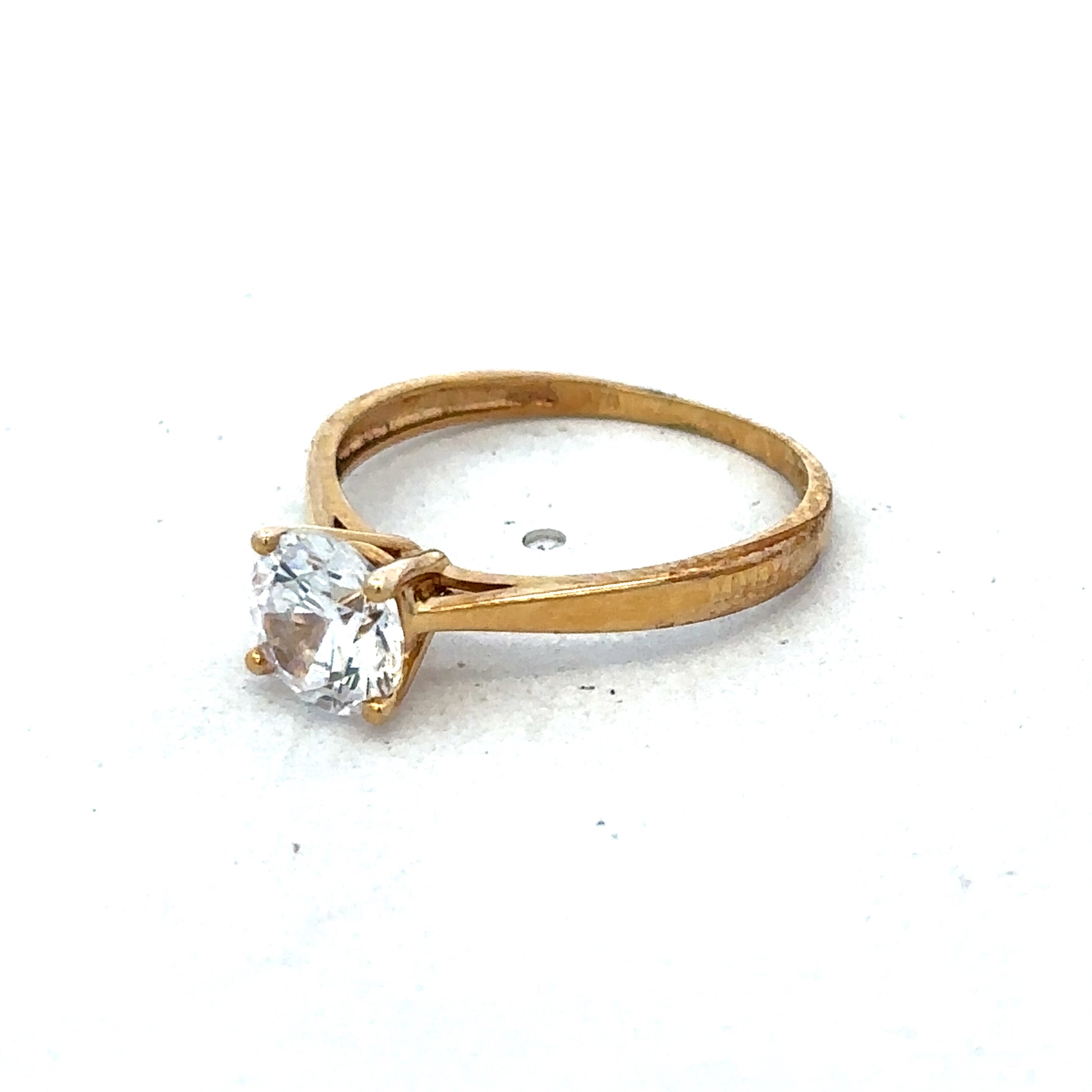 9ct yellow gold ring size L by Reeves and Sons, featuring a smooth polished band with a classic design.