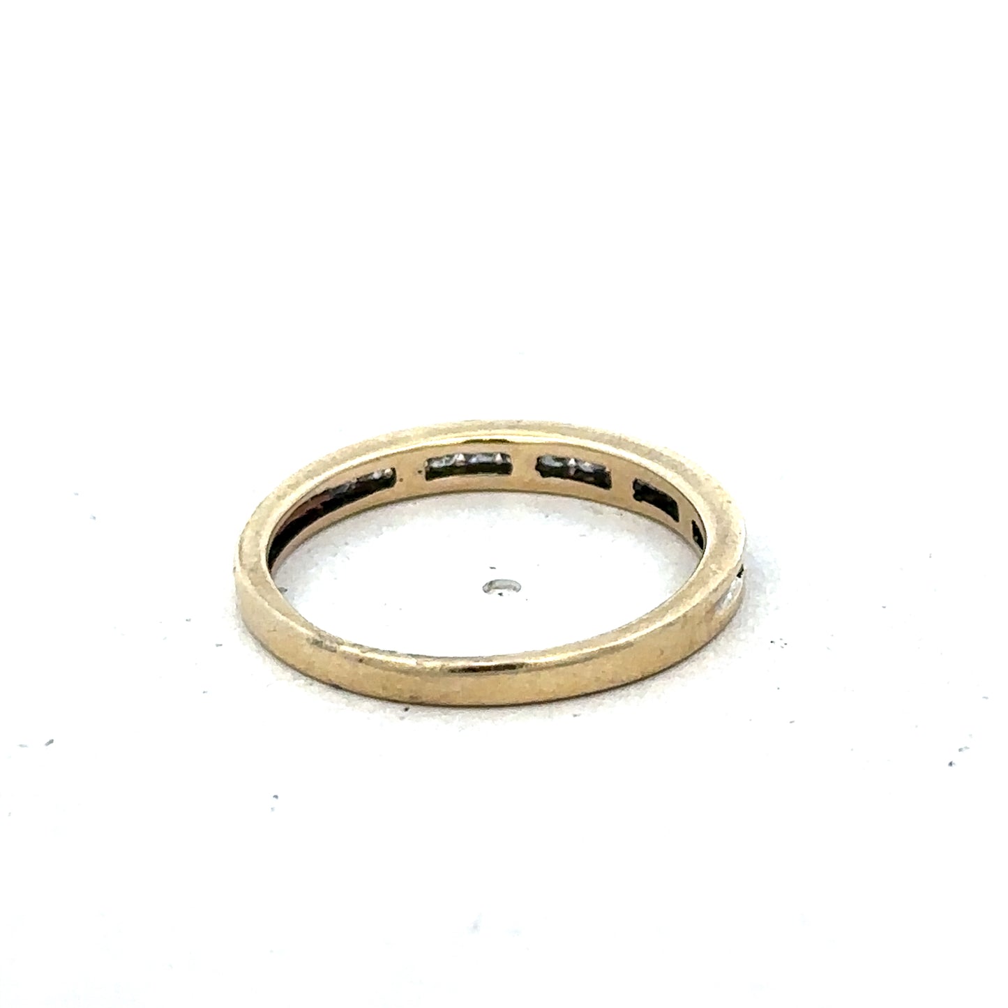 9ct yellow gold diamond half eternity ring in size N with sparkling diamonds, crafted by Reeves and Sons.