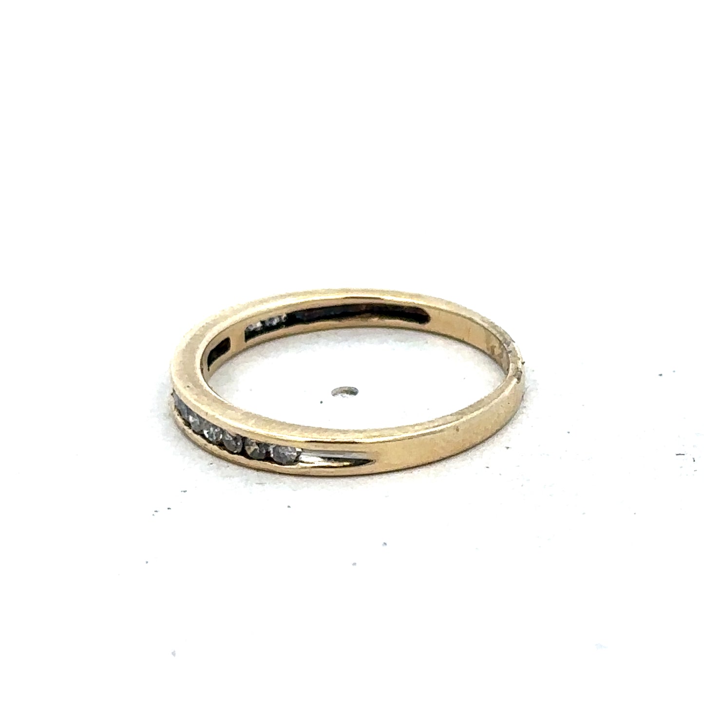 9ct yellow gold diamond half eternity ring in size N by Reeves and Sons, showcasing sparkling diamonds along the band