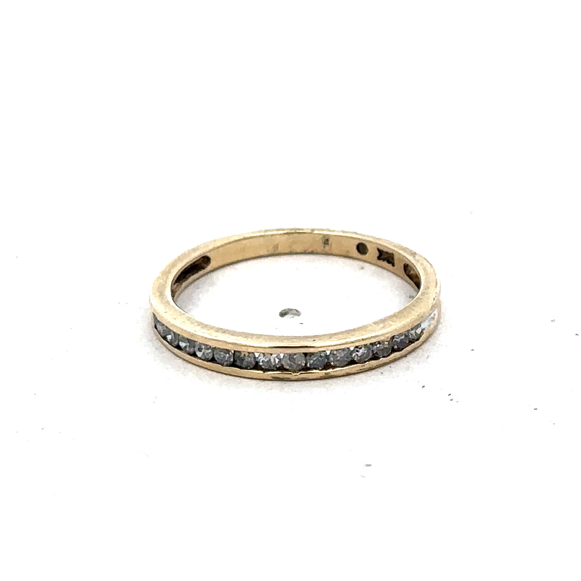9ct yellow gold diamond half eternity ring showcasing sparkling diamonds set in a sleek band, size N by Reeves and Sons.