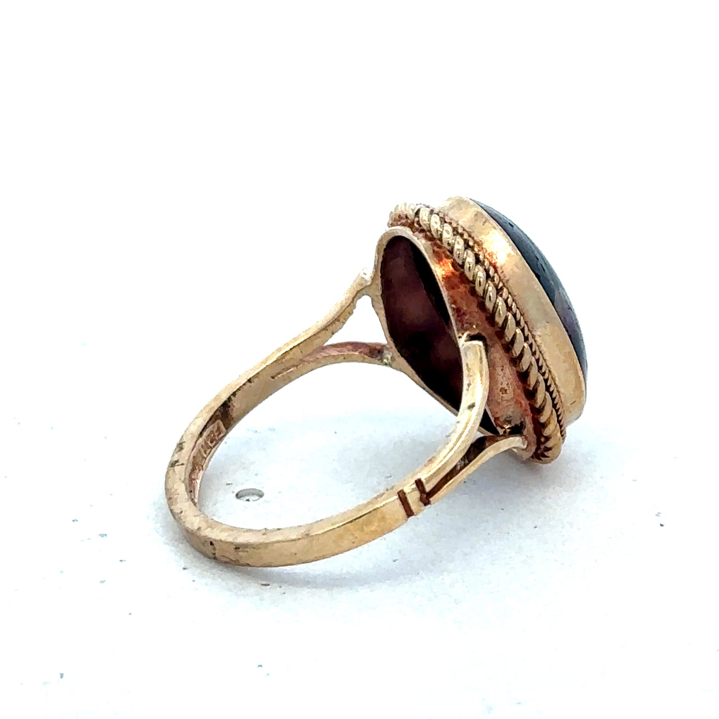 9ct yellow gold ring in size L with a smooth band, crafted by Reeves and Sons.