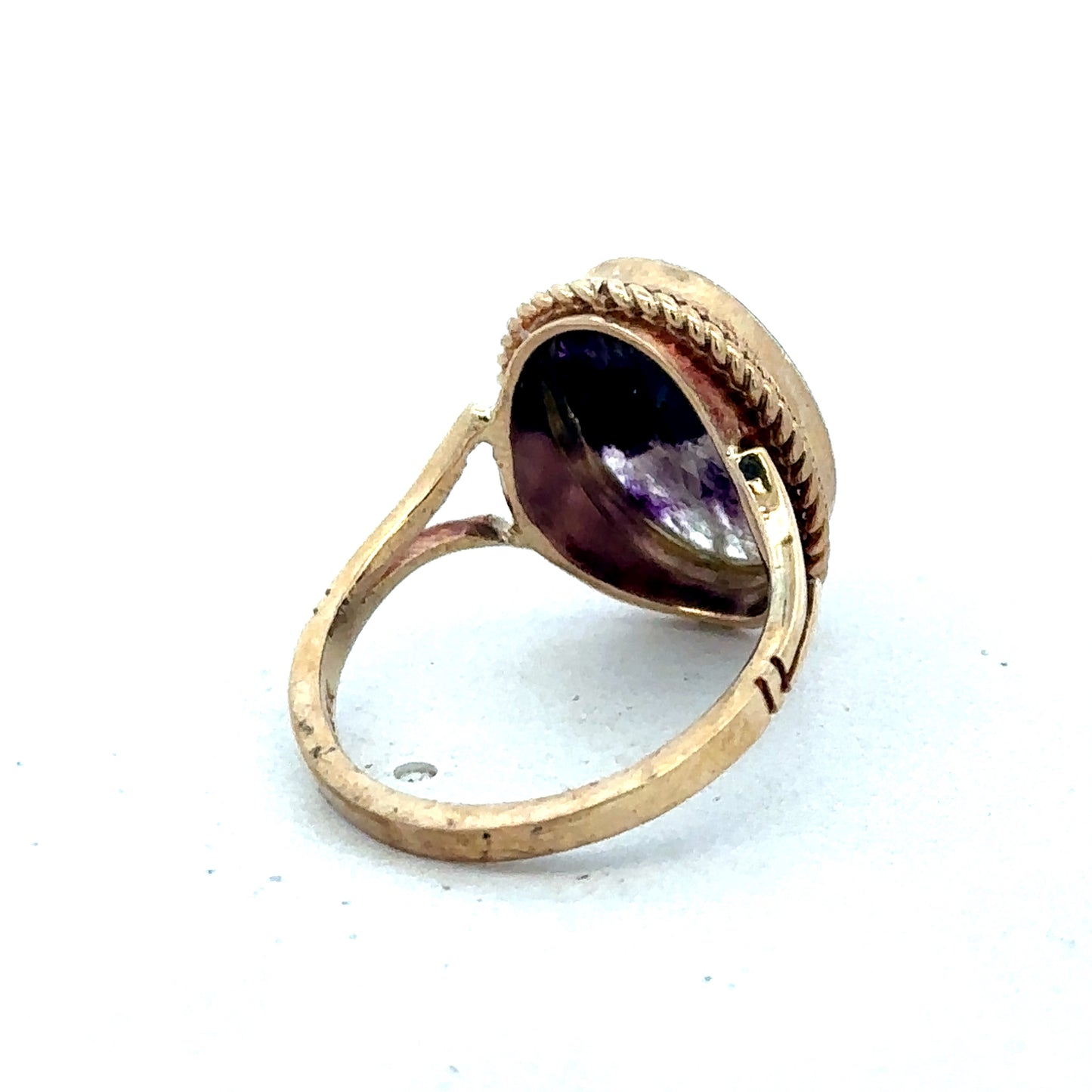 9ct yellow gold ring size L by Reeves and Sons, featuring a smooth polished band and classic design.