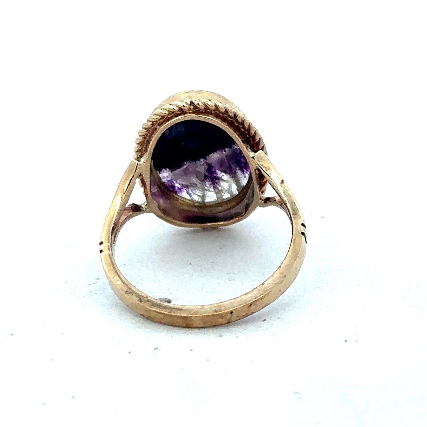 9ct yellow gold ring size L from Reeves and Sons, close-up showing smooth polished band and classic design.