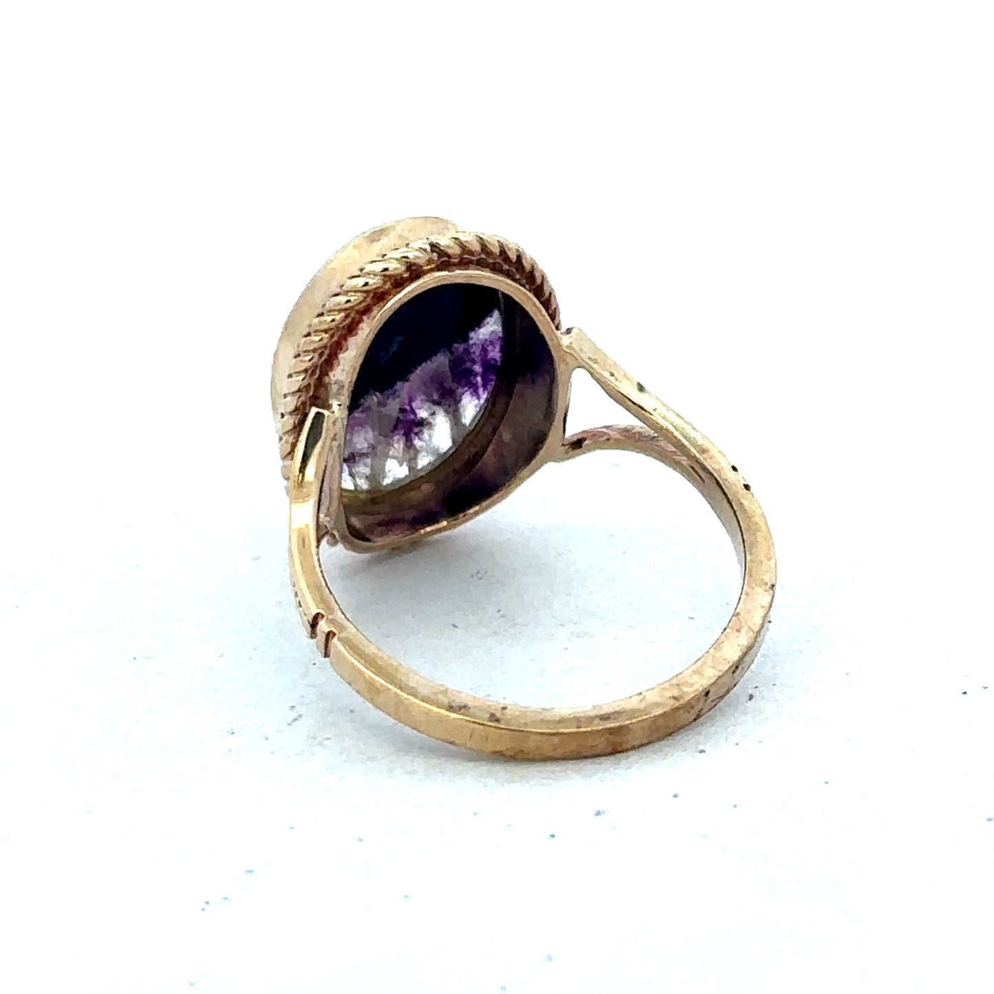 9ct yellow gold ring in size L from Reeves and Sons, showcasing a polished band with a smooth finish.
