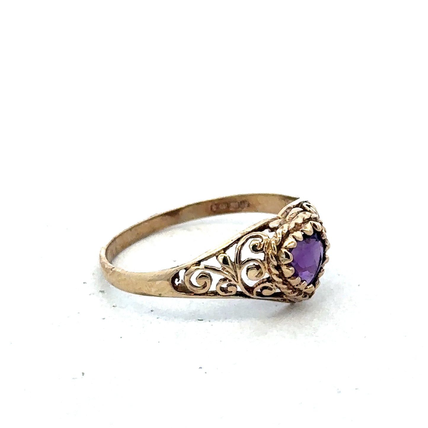 9ct yellow gold ring in size Q by Reeves and Sons, featuring a smooth polished band and elegant craftsmanship.