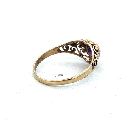 9ct yellow gold ring in size Q from Reeves and Sons, featuring a smooth polished band and classic design.