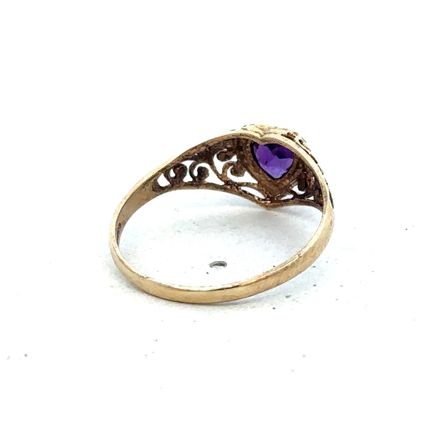 9ct yellow gold ring in size Q with a smooth band, crafted by Reeves and Sons, displayed on a neutral background.