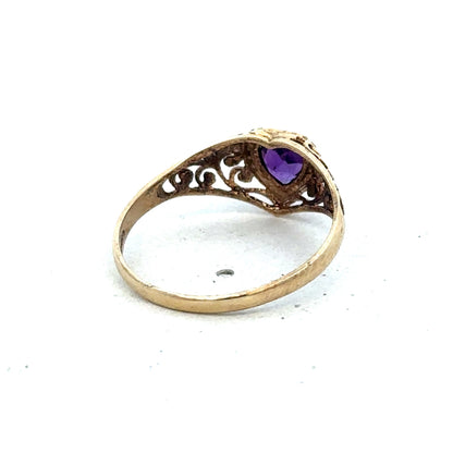 9ct yellow gold ring in size Q with a smooth band, crafted by Reeves and Sons, displayed on a neutral background.