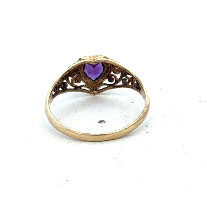 9ct yellow gold ring in size Q by Reeves and Sons, featuring a smooth polished band and classic design.