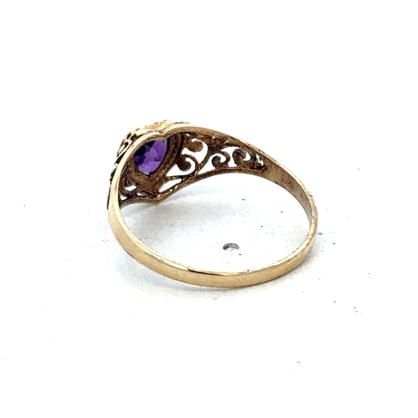 9ct yellow gold ring in size Q by Reeves and Sons, featuring a smooth polished band and elegant design.