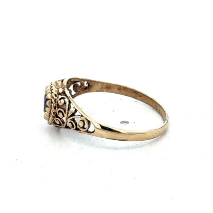 9ct yellow gold ring size Q by Reeves and Sons, showcasing a polished band with a smooth finish.