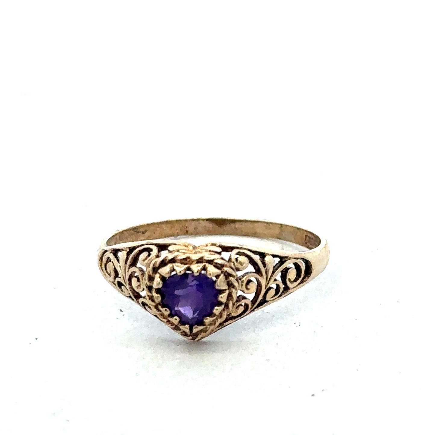 9ct yellow gold ring size Q by Reeves and Sons, close-up showing smooth polished band and elegant design.