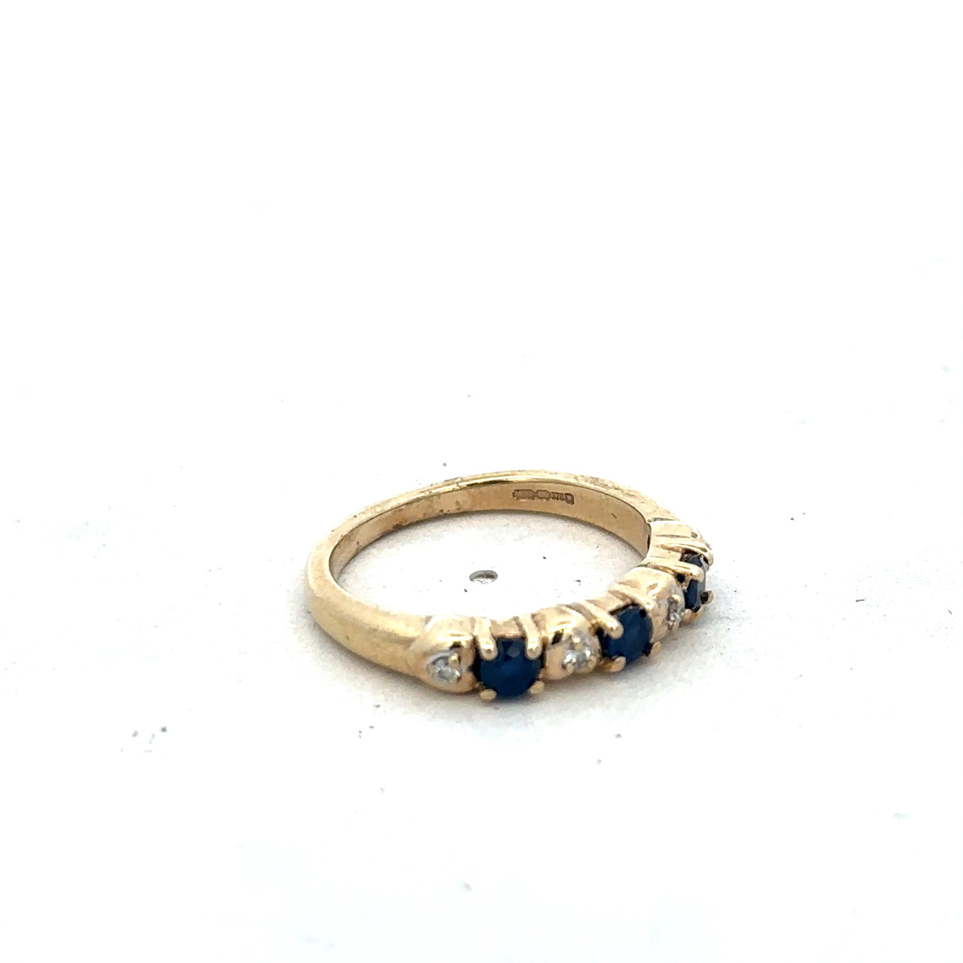 9ct yellow gold sapphire and diamond ring in size M 1/2, featuring a detailed design with sparkling gemstones.