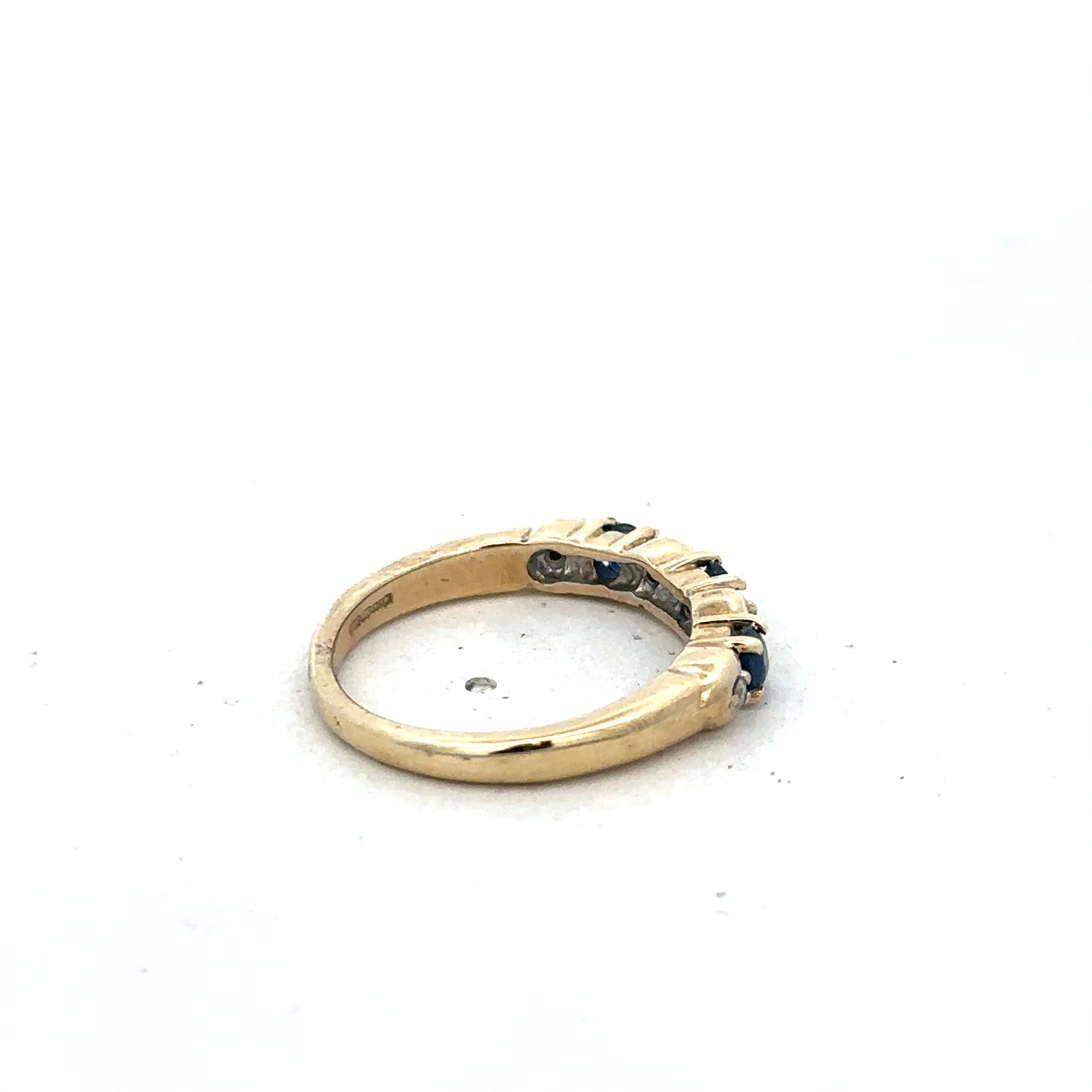 9ct yellow gold sapphire and diamond ring, size M 1/2, with intricate band design, from Reeves and Sons.