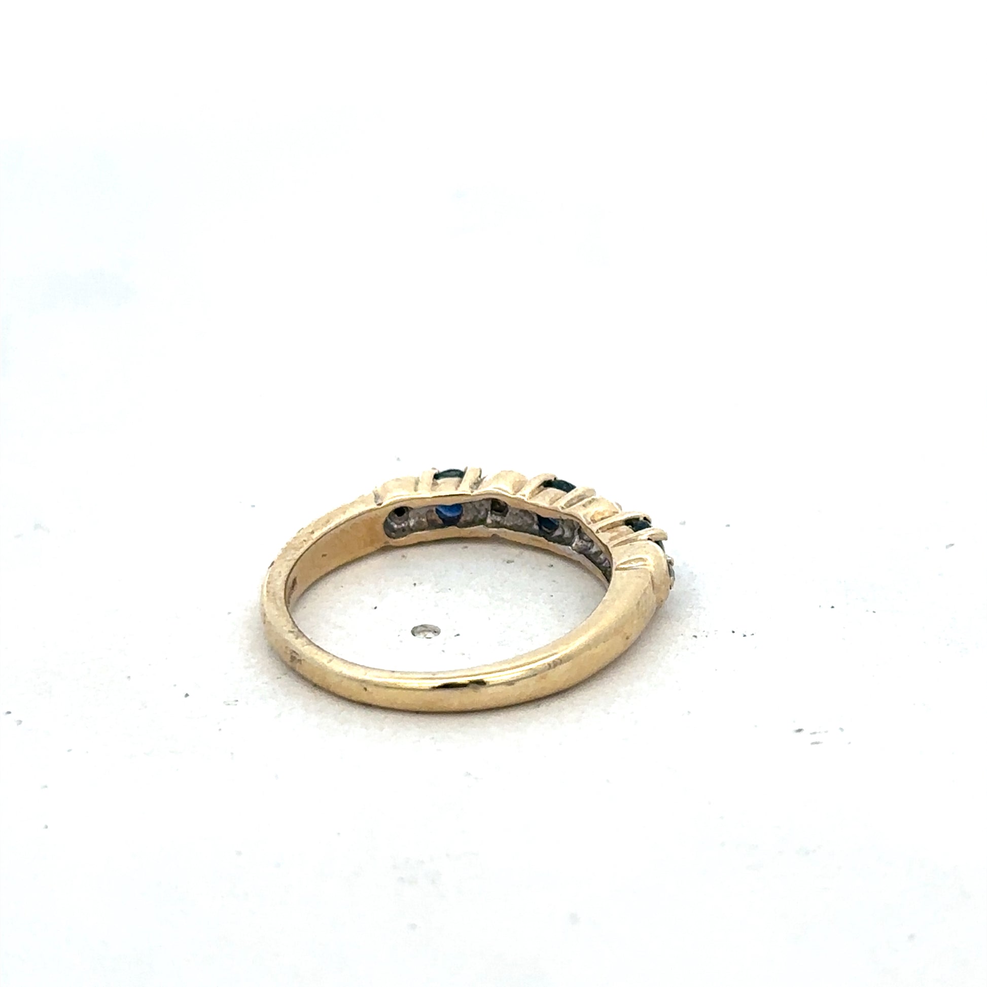 9ct yellow gold sapphire and diamond ring in size M 1/2, featuring intricate design from Reeves and Sons.