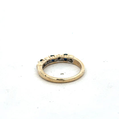 9ct yellow gold sapphire and diamond ring in size M 1/2, featuring a floral design and intricate gemstone settings.