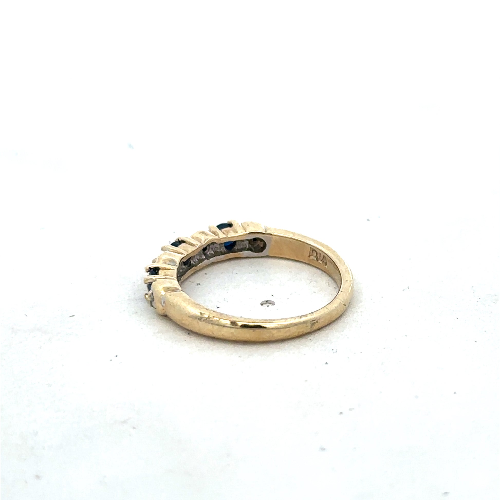 9ct yellow gold sapphire and diamond ring, size M 1/2, featuring a central blue sapphire and sparkling diamonds, by Reeves and Sons