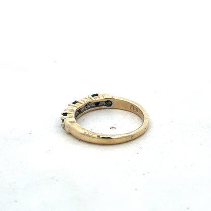 9ct yellow gold sapphire and diamond ring, size M 1/2, featuring a central blue sapphire and sparkling diamonds, by Reeves and Sons