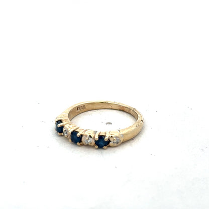 9ct yellow gold sapphire and diamond ring in size M 1/2, featuring a sleek band with sparkling gemstones, by Reeves and Sons.