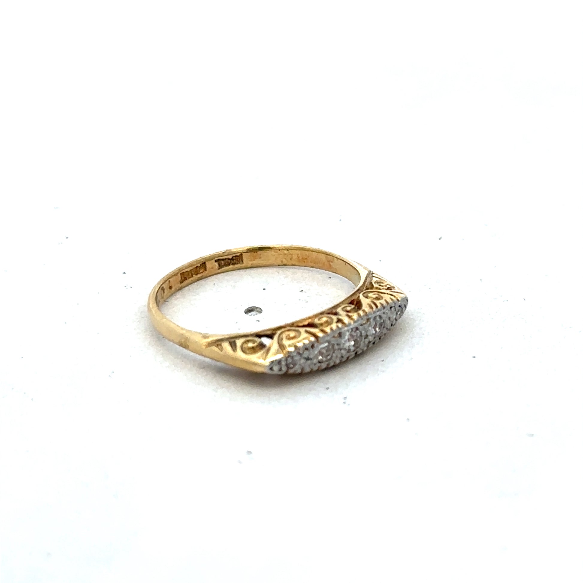 18ct yellow gold diamond ring in size L1/2 by Reeves and Sons, featuring a sparkling diamond centerpiece.