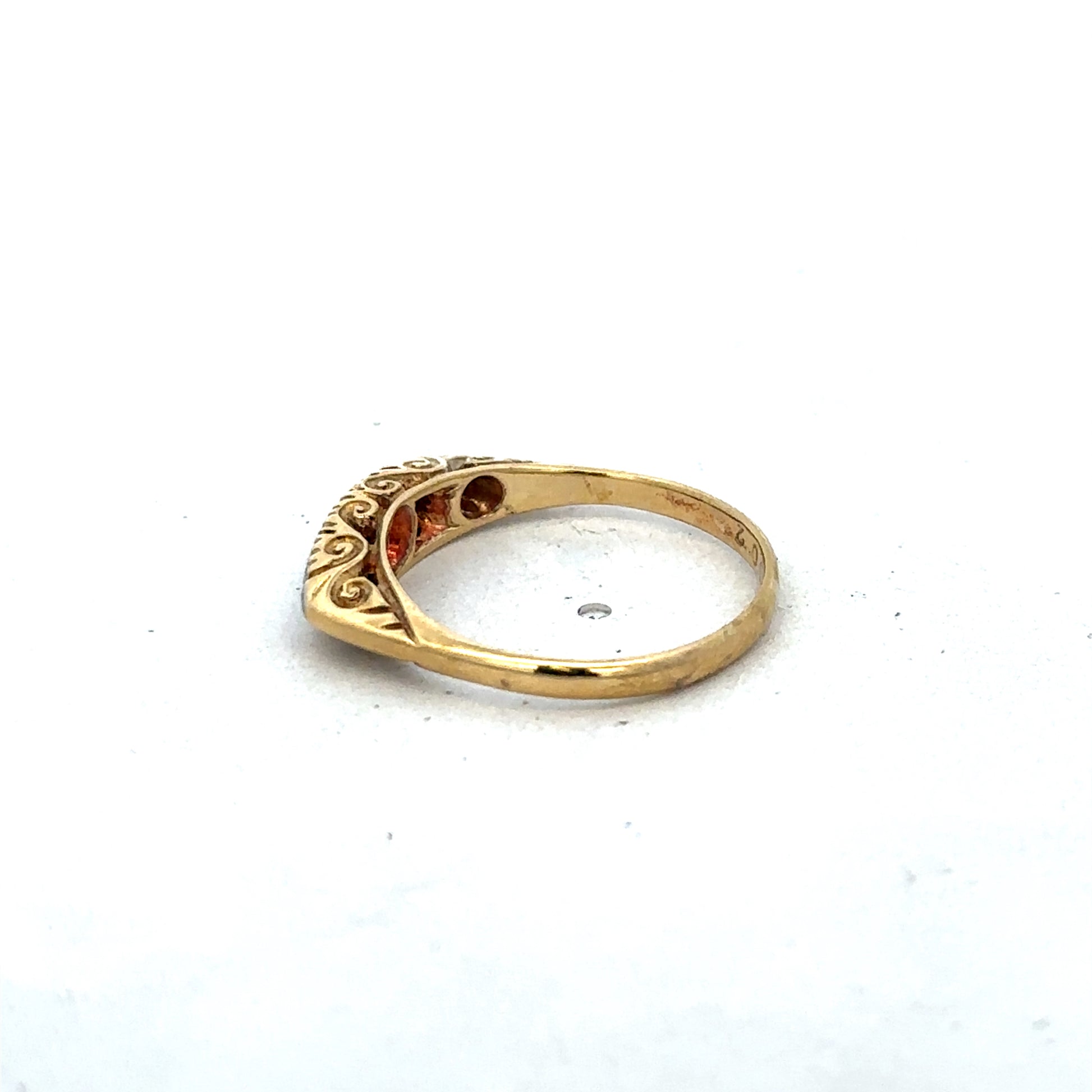 18ct yellow gold diamond ring in size L1/2 by Reeves and Sons, featuring sparkling diamonds and intricate craftsmanship.