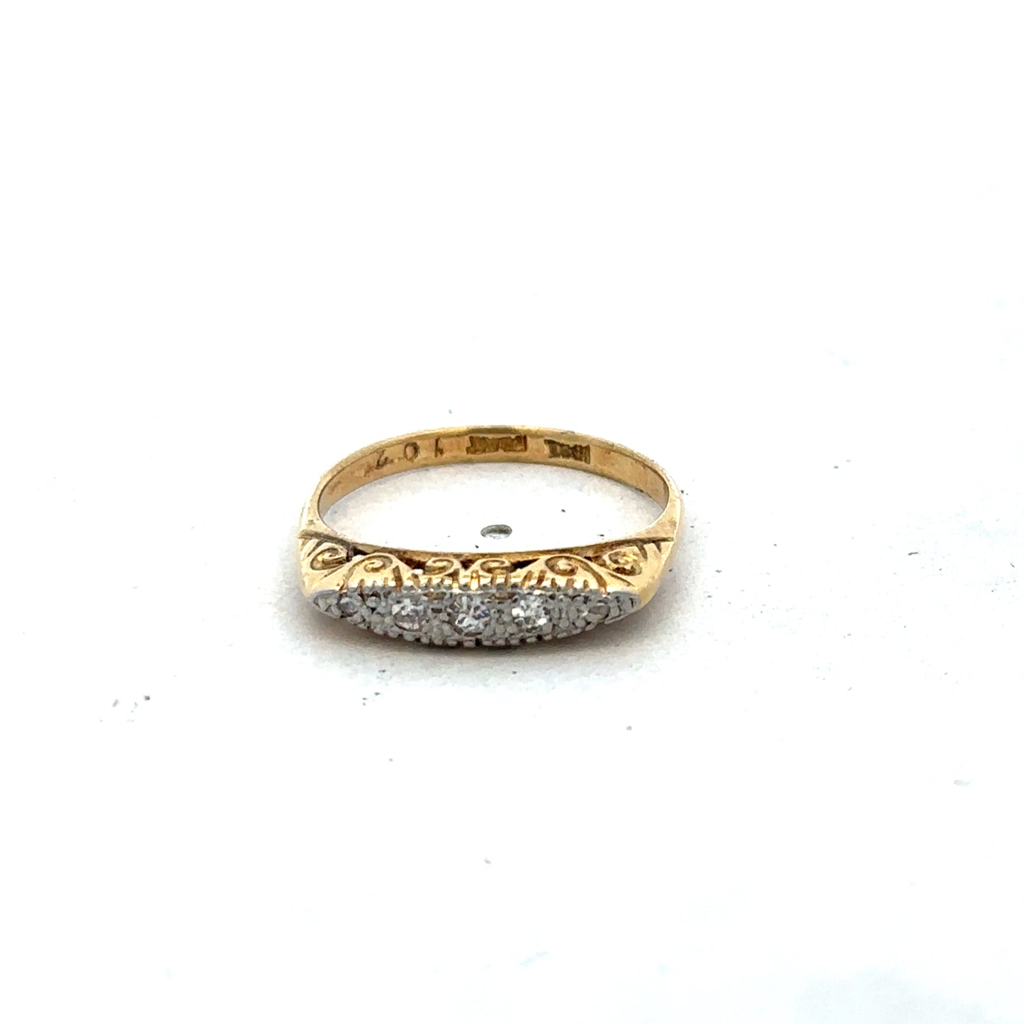 18ct yellow gold diamond ring in size L1/2 with intricate design, crafted by Reeves and Sons.