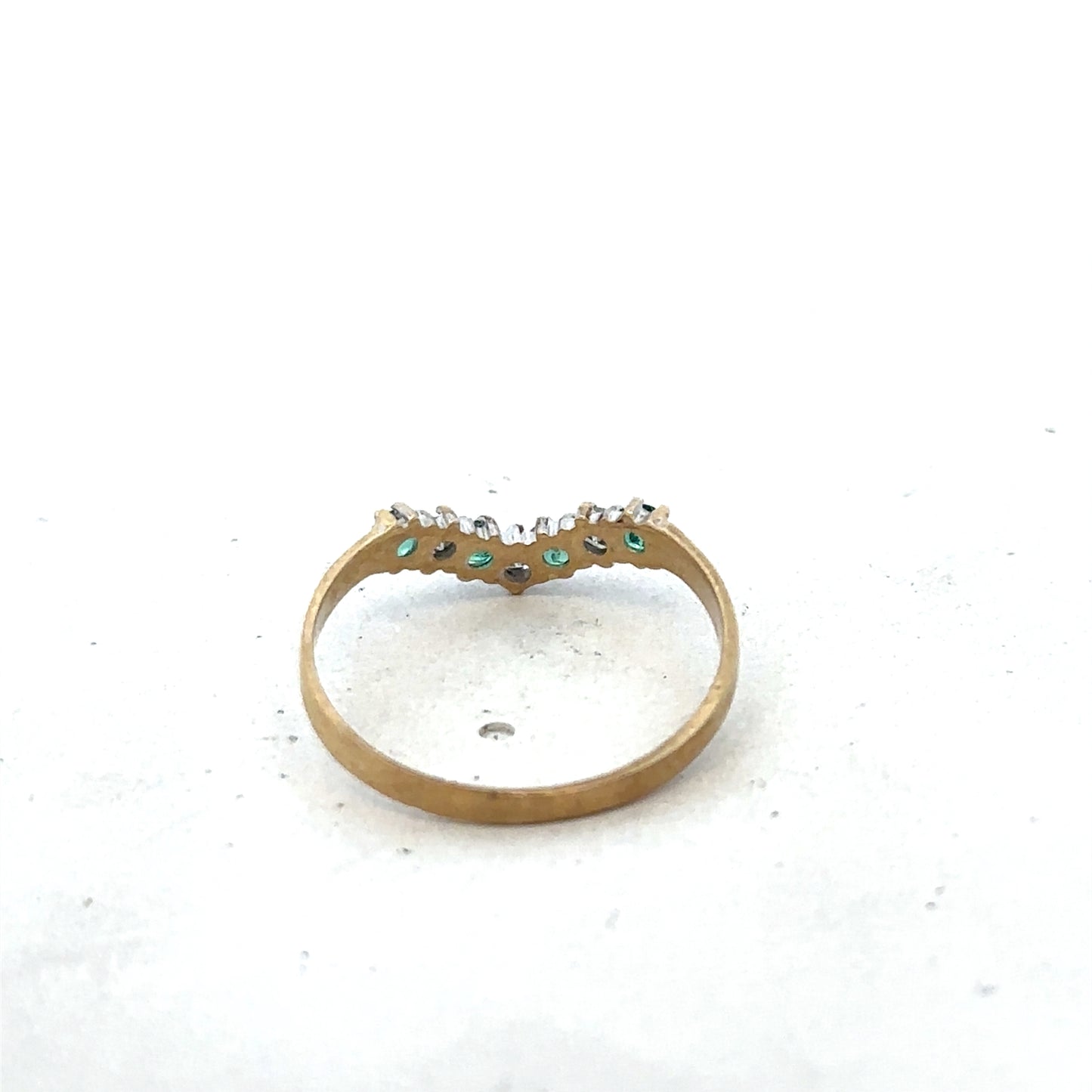 9ct yellow gold emerald and diamond ring featuring intricate design, size O1/2, by Reeves and Sons.