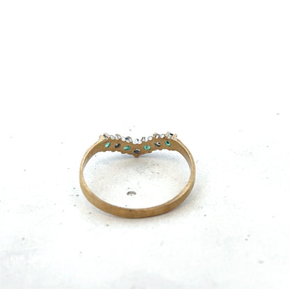 9ct yellow gold emerald and diamond ring featuring intricate design, size O1/2, by Reeves and Sons.