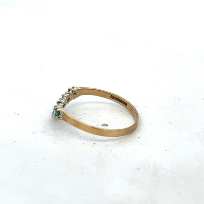 9ct yellow gold emerald and diamond ring by Reeves and Sons, size O1/2, featuring intricate gemstone settings and elegant design.