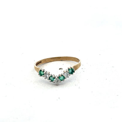 9ct yellow gold emerald and diamond ring with intricate band design, size O1/2, by Reeves and Sons.