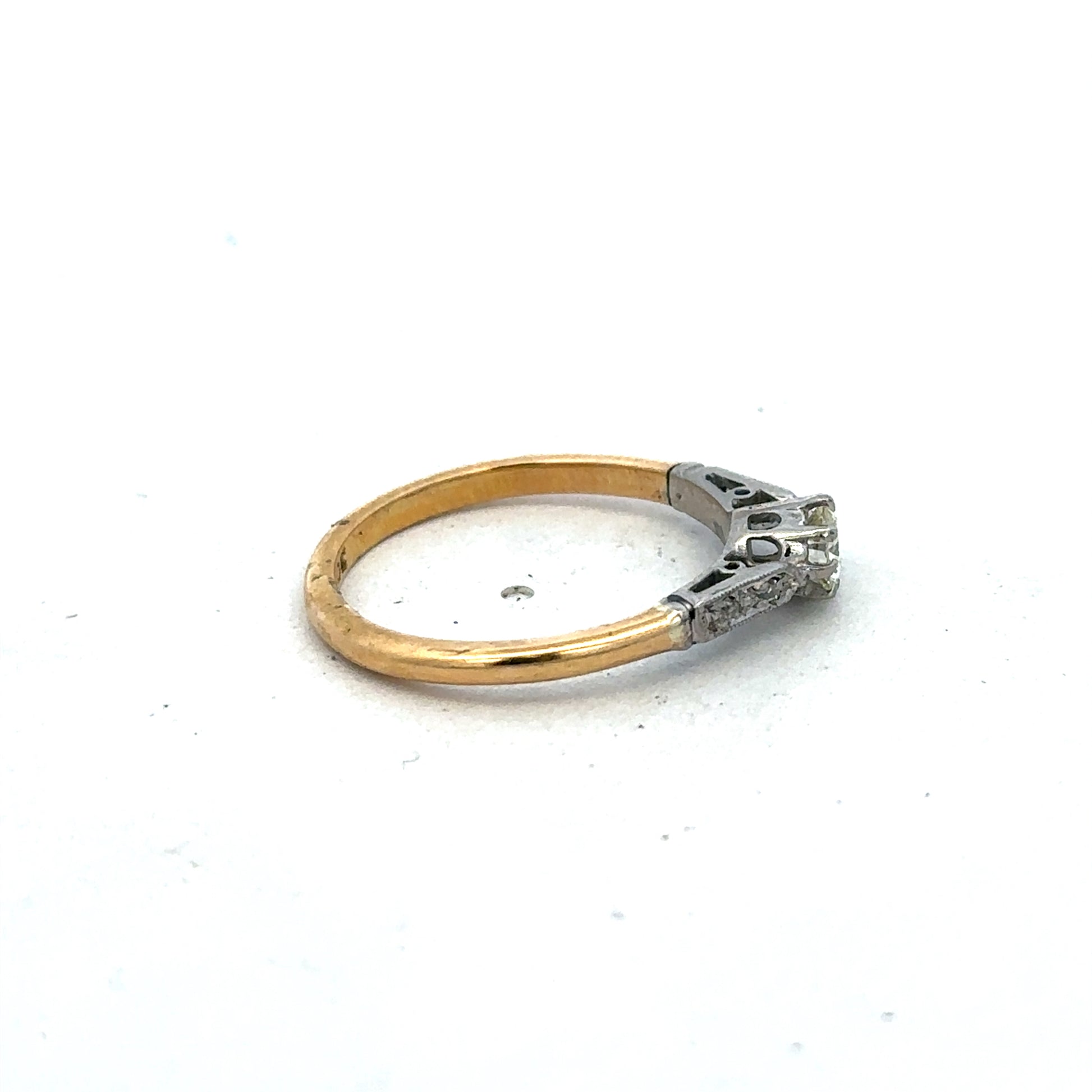 18ct yellow gold diamond ring with a sparkling central diamond, size O, crafted by Reeves and Sons.